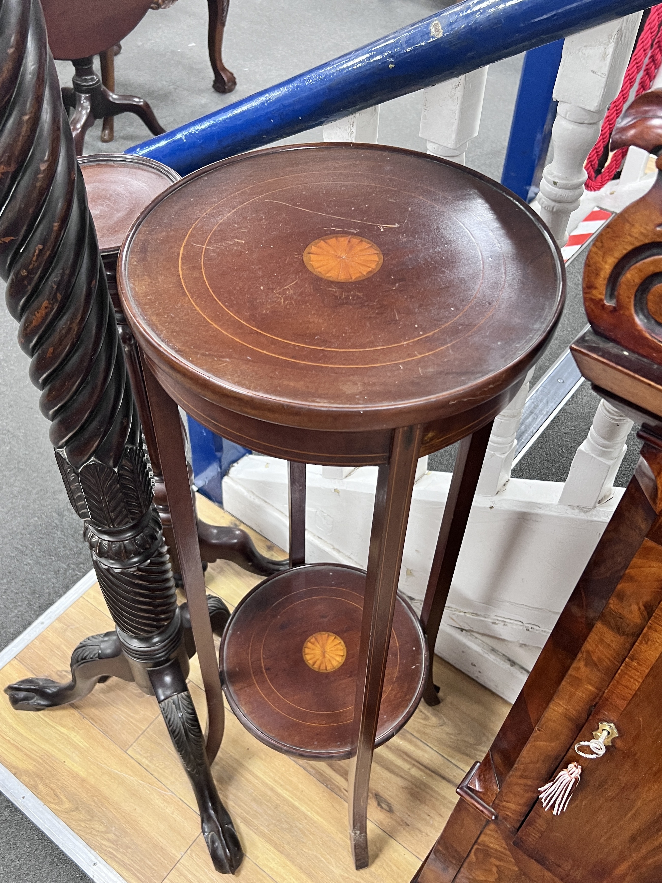 A George III style mahogany torchere, a mahogany plant stand and one other, largest height 149cm